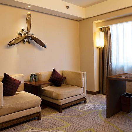 Crowne Plaza Guangzhou City Centre By Ihg - Free Shuttle Between Hotel And Exhibition Center During Canton Fair & Exhibitor Registration Counter Zewnętrze zdjęcie A suite at the hotel